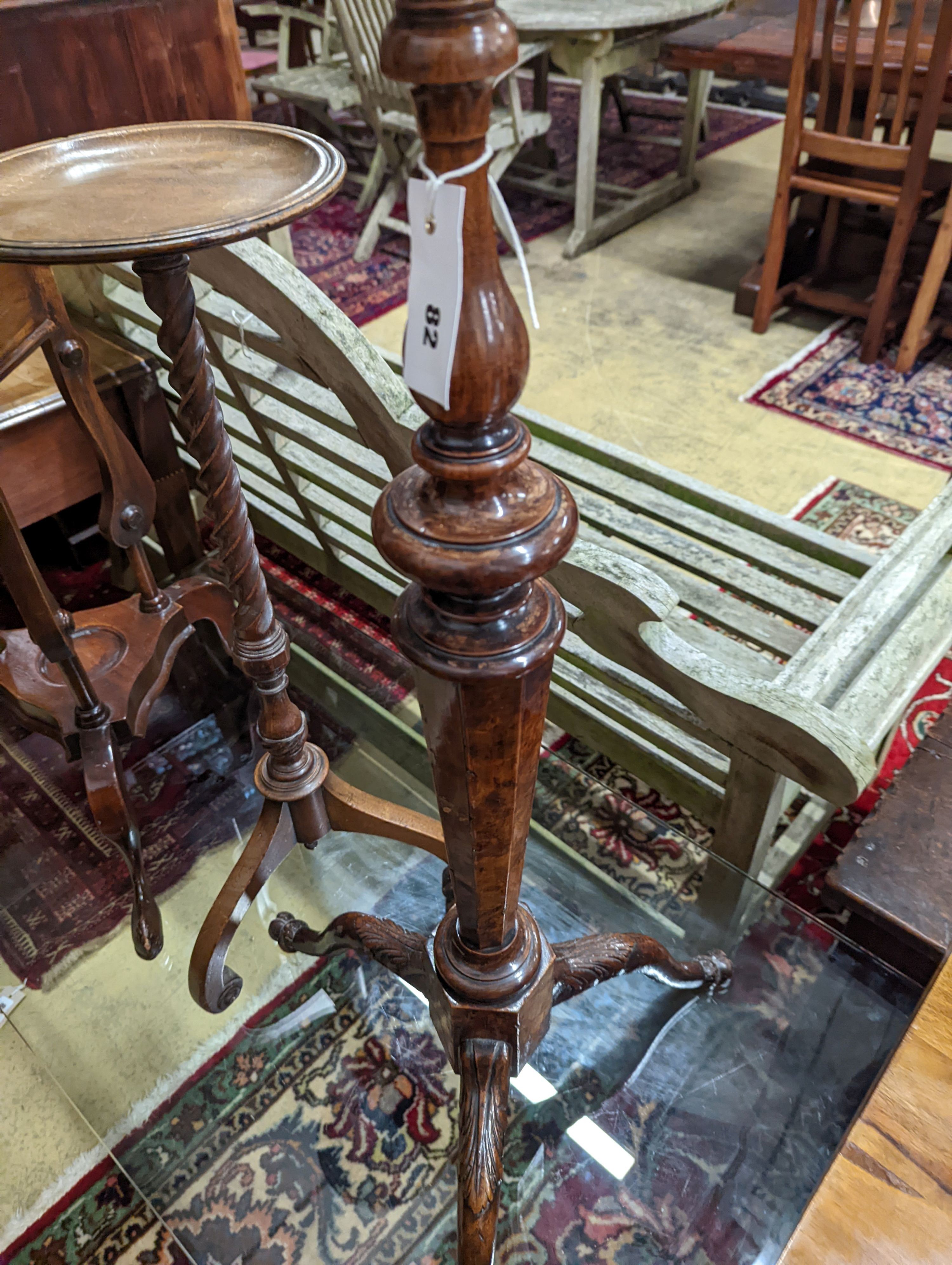 A George I style yew and walnut tripod candlestand, height 97cm, together with one other and a reproduction wash stand
